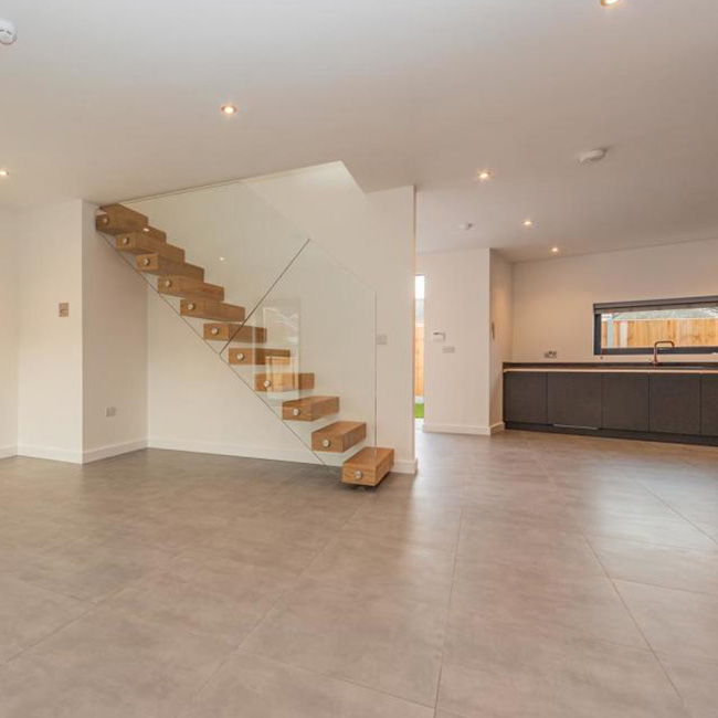 modern open plan living space to the stairway
